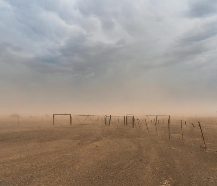 A dust storm on a country road